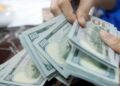 Dólar sobe 1,15% e fecha a R$ 5,09 em dia de cautela